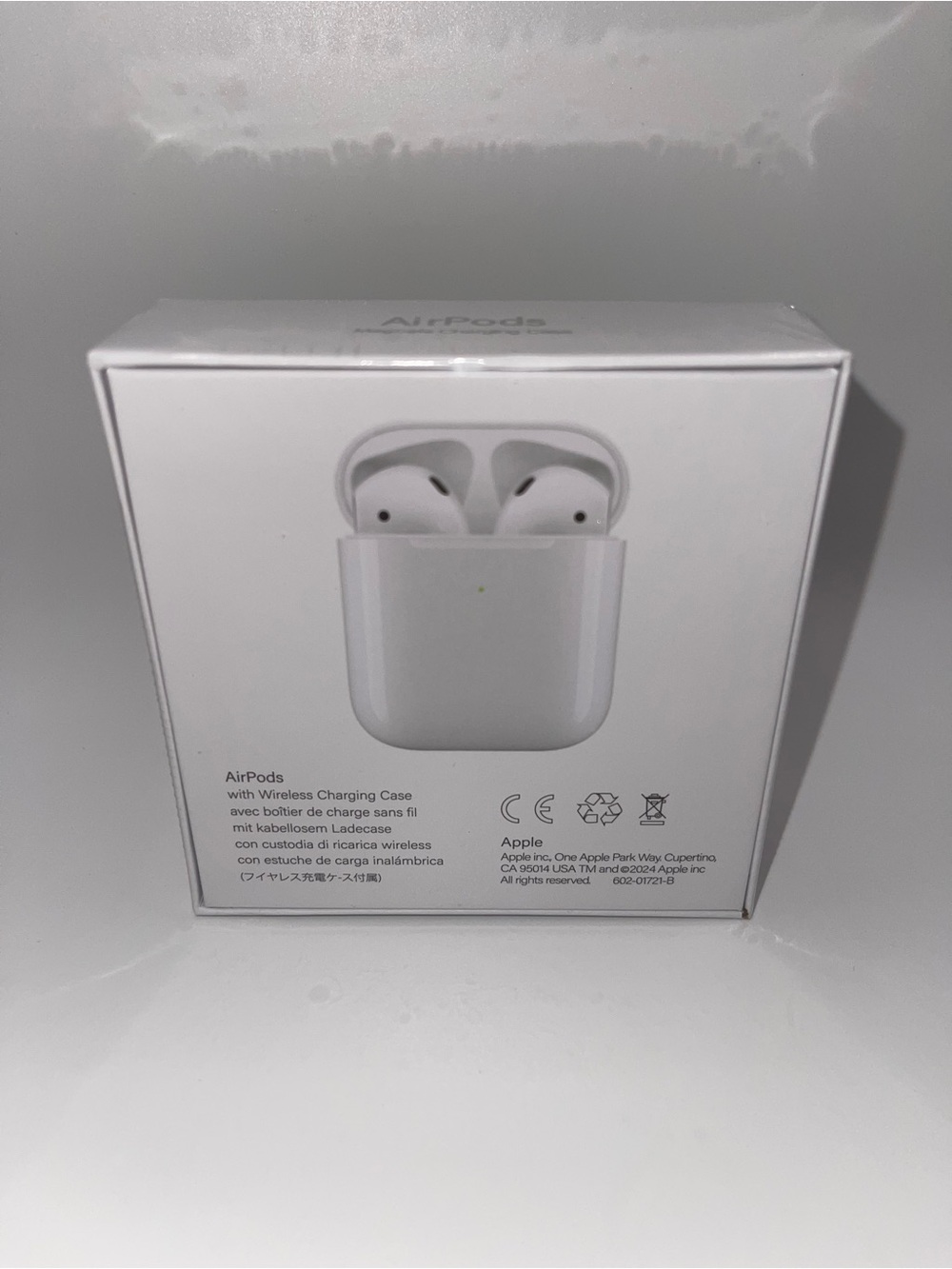Apple AirPods with Wireless Charging Case - White